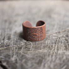 Load image into Gallery viewer, many petal expanding flower stamped on open copper band ring