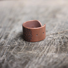 Load image into Gallery viewer, many petal expanding flower stamped on open copper band ring
