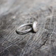 Load image into Gallery viewer, stamped flower on recycled silver river rock centerpiece