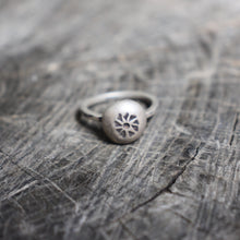 Load image into Gallery viewer, stamped flower on recycled silver river rock centerpiece