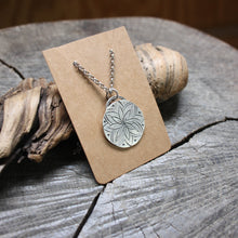 Load image into Gallery viewer, Pretty Eight petal flower stamped on silver disc necklace
