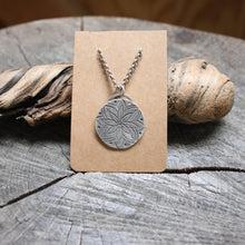 Load image into Gallery viewer, Pretty Eight petal flower stamped on silver disc necklace