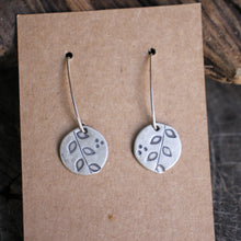 Load image into Gallery viewer, Branch with leaves stamped on silver disc Dangle earrings